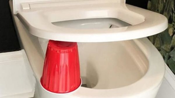 Put A Red Cup Under The Toilet Seat